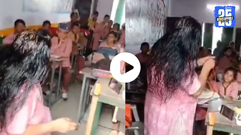 A viral video from a school in Bulandshahr shows a teacher applying hair oil and combing her hair during class hours, as students sit quietly. Following the outrage, the teacher has been suspended pending further investigation.