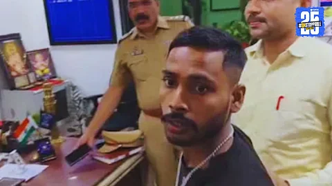 Gokul Jha being handed over to police by MNS workers after brutally assaulting a Marathi girl in Kalyan; multiple serious cases of extortion and violence previously registered against him.