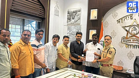 Shashikant Shinde’s supporters protesting inside the police station after an alleged unlawful inquiry at his Lhasurne residence