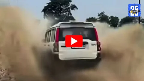 A viral moment where a speeding car drenches a cyclist and then flips into a roadside ditch — a perfect example of instant karma caught on video.