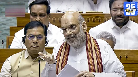 Union Home Minister Amit Shah addressing the Rajya Sabha amid fierce opposition, responding sharply to calls for PM Modi's presence in the House.