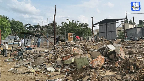 Akalkot Clears 91 Illegal Shops; Traders Protest Bulldozer Action