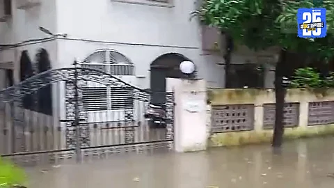 Floodwater entered homes in Thane’s Diaghar area where snakes were spotted floating, creating panic among residents.