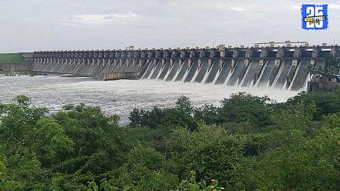 Ujani Dam releasing water into the Bhima River after heavy rainfall in the ghat regions.
