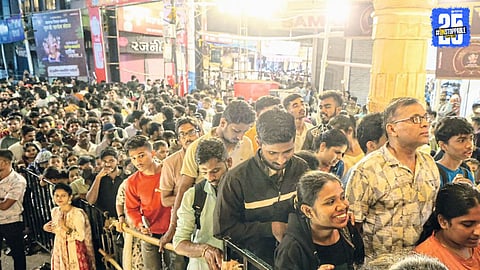 “Devotees gather in large numbers in central Pune, mesmerized by festive decorations and grand displays.”