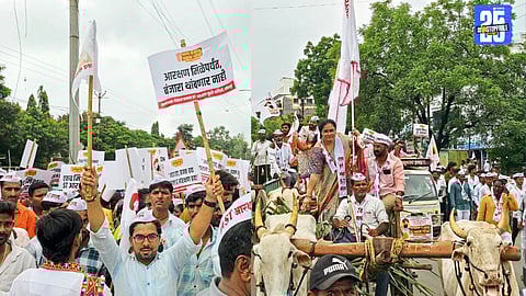 “Banjara community rally in Solapur for ST reservation, with traditional bullock carts and vibrant attire.”