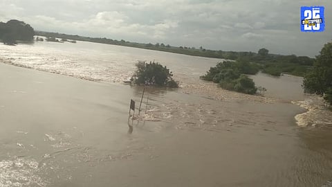 Rescue teams at work to evacuate flood-affected residents as Sena River overflows, isolating seven villages.