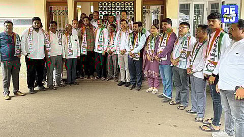 Adv. Udaysingh Patil-Undalkar welcoming new workers into NCP during a party joining program in Satara.