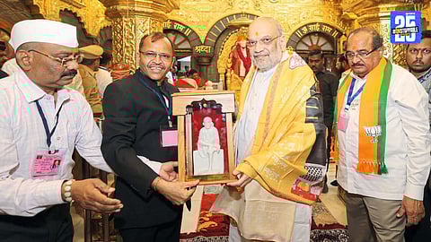 Union Home Minister Amit Shah addressing a conference, urging farmers to adopt ethanol production from food grains with central government support.