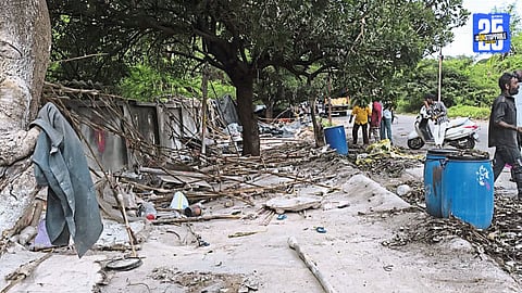 Municipal staff during anti-encroachment drive at Mandai area; 20 encroached huts of idol makers demolished in joint action.