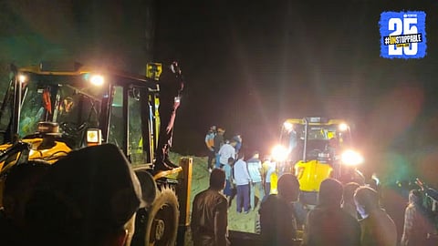 Rescue teams clearing debris after a massive landslide buried a passenger bus in Bilaspur, Himachal Pradesh, claiming 18 lives.