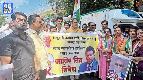 NCP leaders and workers protesting at Samvidhan Chowk demanding action over the attack attempt on the Chief Justice of India.