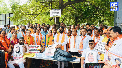 “Shiv Sena activists rally in protest against government; CM and Deputy CMs under public criticism.”
