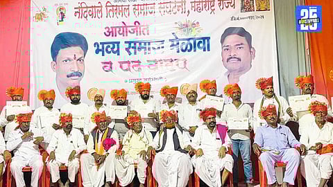 Eknath Atkar addressing the Nandiwale Tirmal community meet, highlighting unity and social upliftment through collective organization.