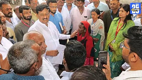 MLA Subhash Deshmukh interacting with residents of flood-affected villages in Satara, inspecting relief distribution.