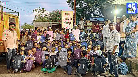 Children in Wangi flood-hit area receive educational kits from Gyan Prabodhini, lighting up their faces with smiles.