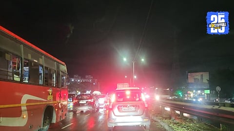 Heavy traffic jam on Pune-Bengaluru Highway near Katraj Tunnel to Warje stretch, with vehicles stranded for over an hour due to congestion.