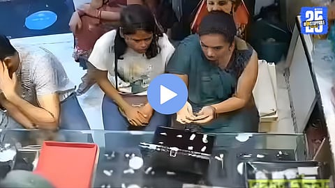 CCTV footage captures a mother teaching her daughter to steal jewelry from a gold shop — the shocking video has now gone viral online.