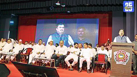 Prof. Ram Shinde offering floral tribute to late Shivajirao Kardile during the all-party condolence meet in Ahmednagar.