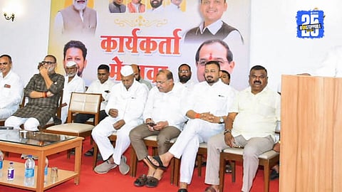 Minister Radhakrishna Vikhe Patil during a meeting with workers in Shirdi; announcement of Spiritual Corridor project.
