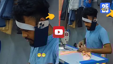 A creative tailor uses a handmade fabric strap around his head to hold his phone while stitching — an innovative desi jugaad that’s gone viral on social media.