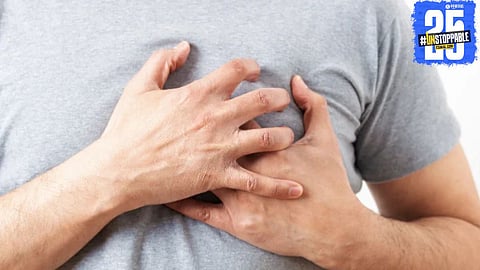 A healthcare professional explaining early detection and symptoms of breast cancer in men.