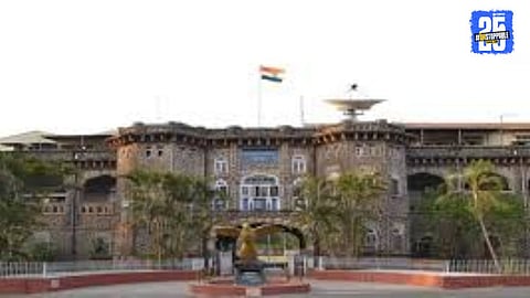 Satara police officials reviewing records as part of a district-wide drive to identify criminals and maintain law and order.