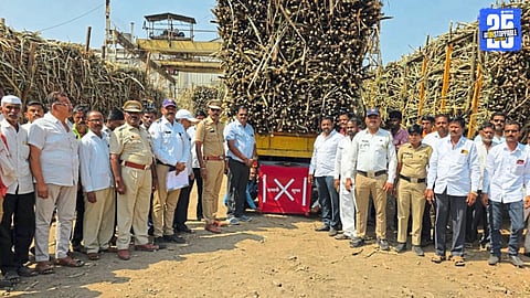 PSI Vijay Pise addressing workers during the road safety awareness drive at Damaji Sugar Factory; focus on preventing drunk driving.
