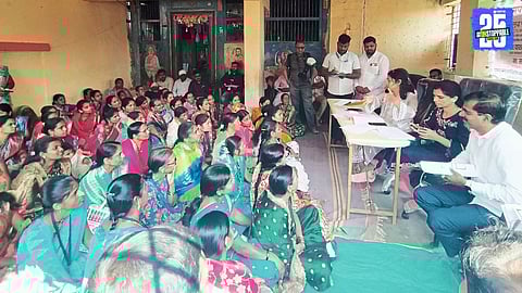 CEO Yashni Nagarajan interacting with Banpuri villagers during Panchayati Raj Abhiyan visit; villagers inspired by her encouraging words.
