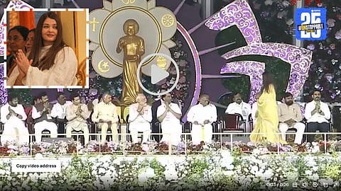 Aishwarya Rai Bachchan touching Prime Minister Narendra Modi’s feet during the Sathya Sai Baba centenary celebration event in Andhra Pradesh.