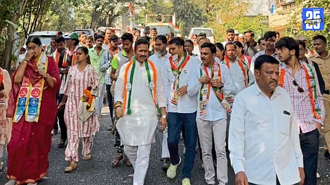 MLA Shashikant Shinde during the Satara padayatra, greeted by enthusiastic supporters.
