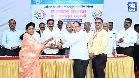 Dr. Digambar Durgade addressing the Cooperative Meet organized by Sanmitra Cooperative Bank,