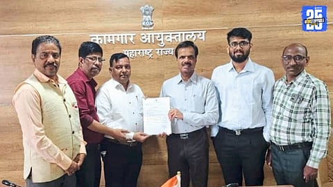 Contract electricity workers celebrating after the court declares them permanent employees following a 13-year-long legal struggle.