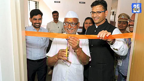 Judicial officers and officials during proceedings of the Medha Lok Adalat where multiple cases were resolved.