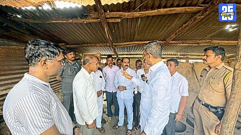 Minister Shambhuraj Desai interacting with disaster-affected families in Nadoli village.