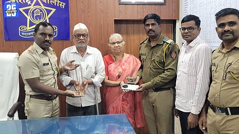 Othur police handing over recovered stolen property worth ₹3.87 lakh to the complainant.