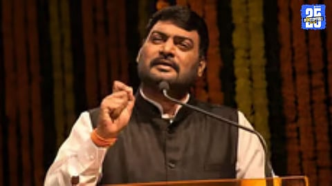 Shiv Sena leader Nitin Banugade-Patil addressing party workers during a political meeting.