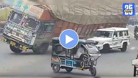 hay-laden truck overturns onto an SDO's Bolero vehicle after hitting a divider on Nainital Road near Pahadi Gate in Rampur, Uttar Pradesh, resulting in the tragic death of the driver.