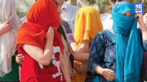 Police officials during a raid on hotels in Umbrj under Satara taluka.