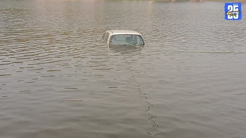 Brave Police Rescue Two as Car Skids Off Road and Falls into Pond