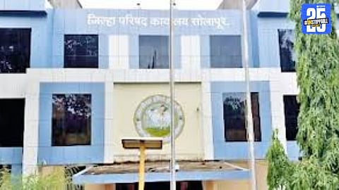 Officials verifying voter lists during preparations for Solapur district council elections