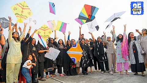 Colorful kites soaring high as Nagpur residents celebrate the kite festival with music and joy.