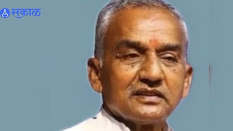 Shankar Anna Dhondge joins Shiv Sena in Mumbai as Deputy CM Eknath Shinde looks on.