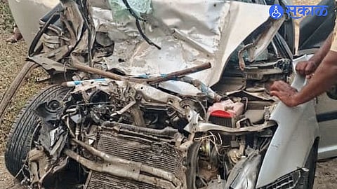 Damaged car and truck after a fatal collision on the Shrirampur–Sangamner road in Ahmednagar district.