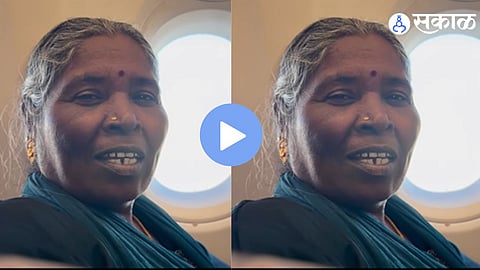 Mother experiencing her first flight journey from a window seat as her son records the emotional and heartwarming moment that later went viral on Instagram.