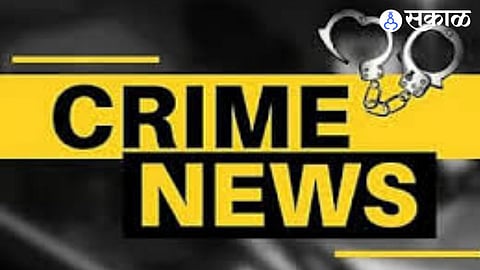 Crime Branch demolishes illegal liquor setup in Wagholi using JCB during a raid.