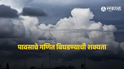 Dark monsoon clouds gather over Indian farmlands as forecasts indicate below-normal rainfall in 2026 due to El Nino conditions.