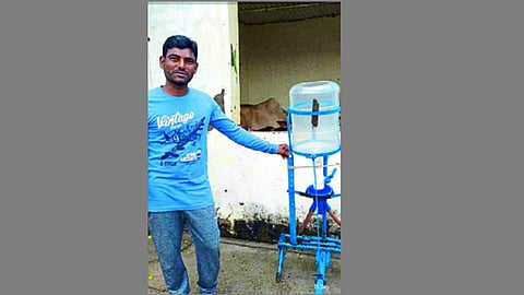 farmer made fertilizer spreading machine at home