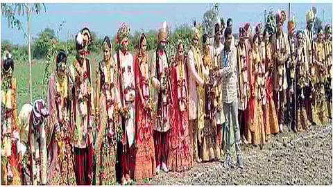 Thirteen couples married in a communal marriage of Gujar community