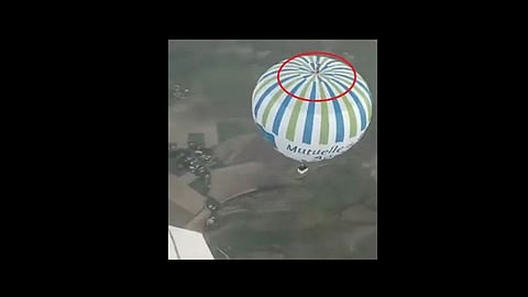 youth dancing top of hot ballon at france